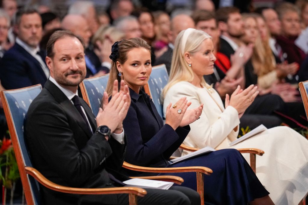 The Princess with her parents, Crown Prince Haakon and Crown Princess Mette-Marit