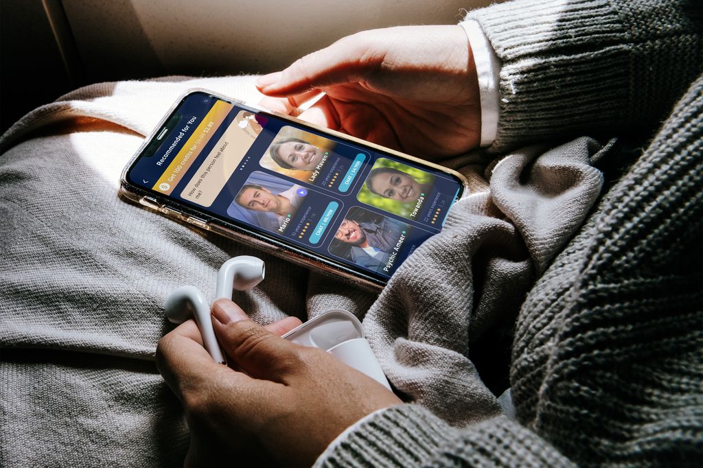 woman with nebula app on phone