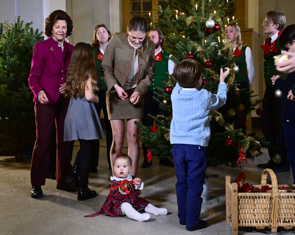 Queen Silvia and her grandchildren receive this year's Christmas trees at the Royal Palace in Stockholm, Sweden, on December 15, 2025, from the Swedish Forestry Students' Union. This image: 
Queen Silvia, Princess Estelle, Princess Ines.
Sweden Royal Palace Christmas Tree, Stockholm - 15 Dec 2025