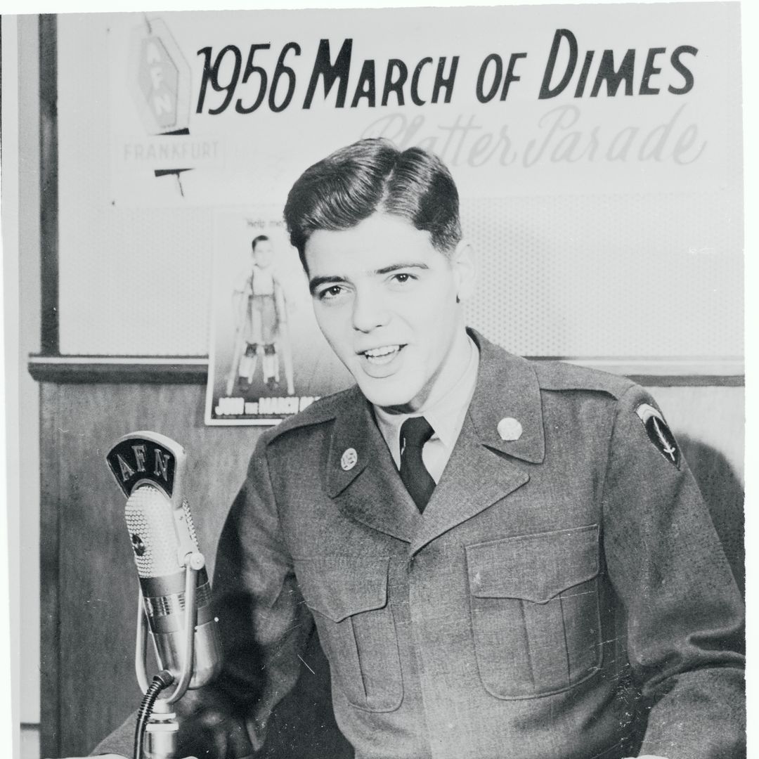 The records of singers Rosemary and Betty Clooney, always a hit with members of the armed forces, are particular favorites of this Armed Forces network disk jockey. He's their brother, Pvt. Nick Clooney, of Maysville, Ky. Nick usually spins them on the late night show "Melody-go-Round", which originates in Frankfurt. But, he's pictured in action here during the AFN's "Platter Parade", special yearly show to win GI support for the March of Dimes campaign.