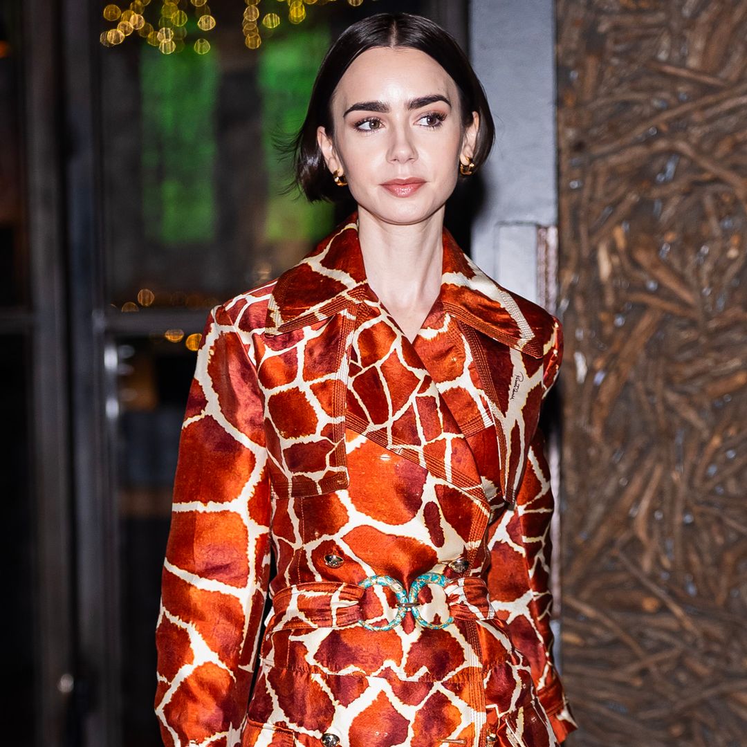 Lily Collins makes a case for corsetry in suave suited-and-booted look