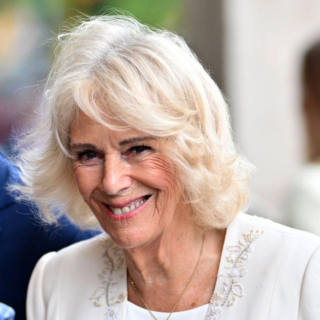 Queen Camilla wears modern version of her wedding dress