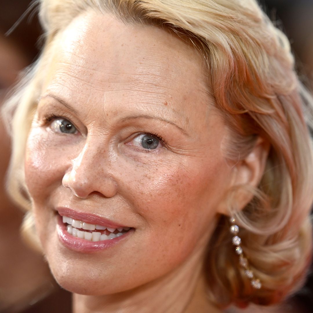 Pamela Anderson looks virtually unrecognizable as she divides fans with new curly red-hued 'granny' hairstyle